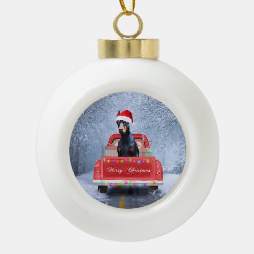 Doberman Dog in Snow sitting in Christmas Truck  Ceramic Ball Christmas Ornament