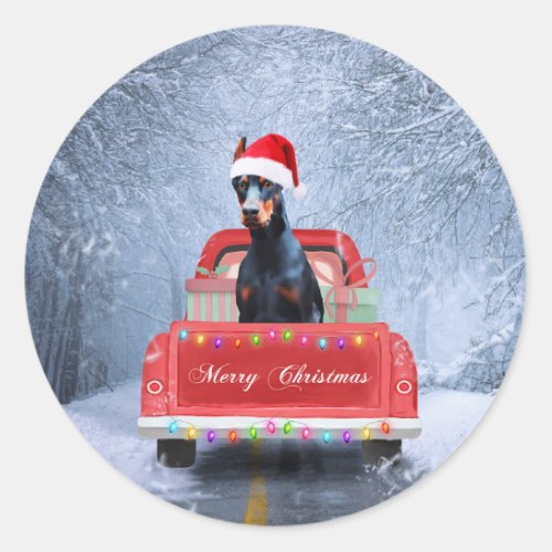 Doberman Dog in Snow sitting in Christmas Truck  Classic Round Sticker