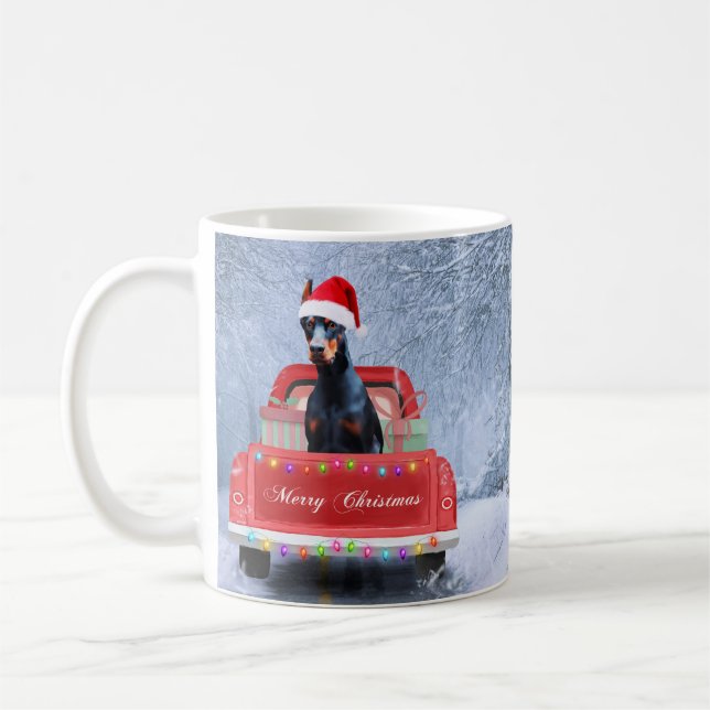Doberman Dog in Snow sitting in Christmas Truck  Coffee Mug (Left)