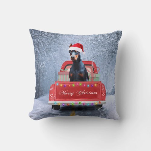 Doberman Dog in Snow sitting in Christmas Truck Throw Pillow