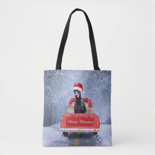 Doberman Dog in Snow sitting in Christmas Truck Tote Bag