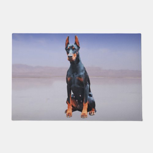 Doberman Dog Sitting On Beach Doormat
