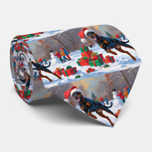Doberman Running in Snow with Christmas Hat Neck Tie