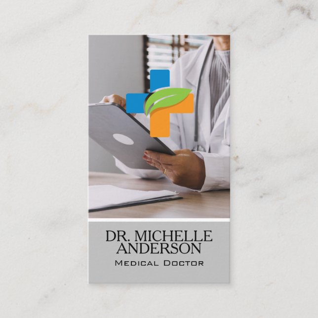 Doctor Looking Over Patients Charts Business Card (Front)