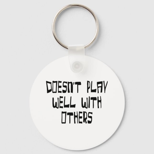 Doesn't play well with others keychain (Front)