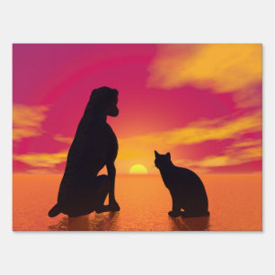 Dog and cat friendship at sunset sign