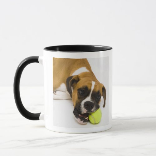 Dog biting tennis ball mug