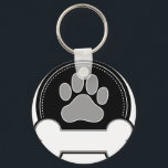 Dog Bone and Paw Keychain<br><div class="desc">A dog paw print and dog bone with room for text in a circular design.</div>