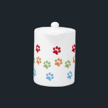 Dog footprint teapot<br><div class="desc">Dog footprint of many colors, red, orange green and blue. Fun and youthful design that shows the tracks of a dog. Ideal for lovers of pets and animals.</div>