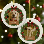 Dog Holiday Christmas Photo Custom Name Wreath Ceramic Ornament<br><div class="desc">Celebrate the season with this personalized holiday ornament featuring a festive wreath design, a custom photo, and your dog’s name. A perfect keepsake for pet lovers, this ceramic ornament adds warmth and joy to your Christmas tree while showcasing your furry friend in style. Makes a thoughtful gift for family, friends,...</div>