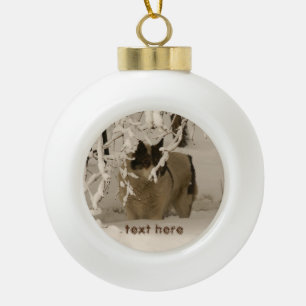 Dog in winter ceramic ball christmas ornament