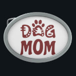 Dog Mom Belt Buckle<br><div class="desc">Celebrate your love for your furry friend with “Dog Mom Design” Charming design features a bold “Dog Mom” text accompanied by an adorable paw icon, making it the perfect choice for all proud dog moms. “This design is customizable. Click the ‘Edit Design’ button to personalize the design. You can change...</div>