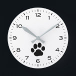 Dog Paw Print with Hours and Minutes Round Clock<br><div class="desc">A fun wall clock for the home or office. Makes an original gift for dog lovers. Check out Jenn’s Doodle World for even more decorative clocks and dog breed themed home decor.</div>
