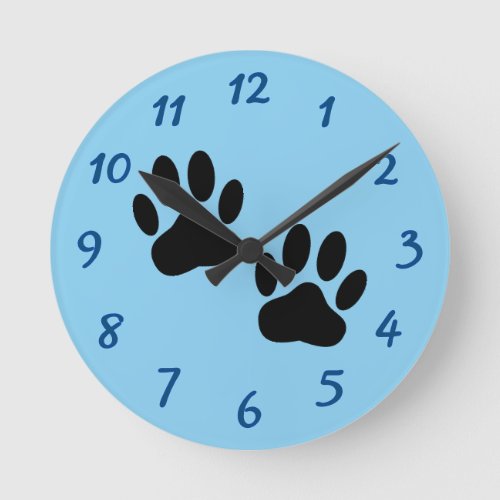 Dog Paw Prints On Baby Blue Round Clock