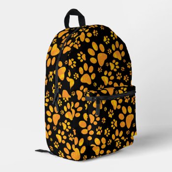 Dog Paw Prints Orange Printed Backpack by ironydesigns at Zazzle