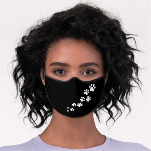 Dog Paws Snow Pattern On Solid Black Background Premium Face Mask