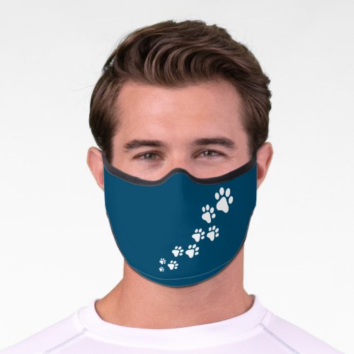 Dog Paws Snow Pattern Solid Teal Blue Background Premium Face Mask