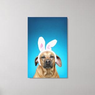 Dog portrait wearing Easter bunny ears Canvas Print