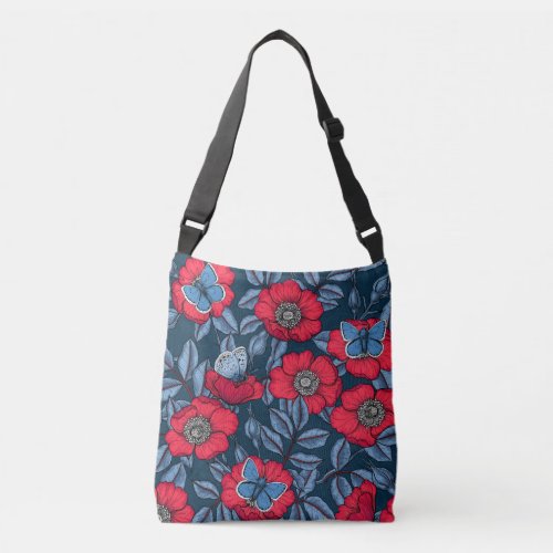 Dog rose and butterflies in blue and red crossbody bag