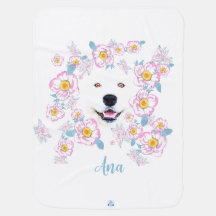 Dog Samoyed and pink flowers