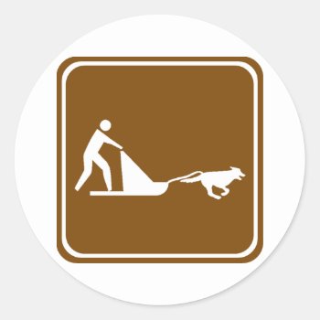 Dog Sledding Highway Sign Classic Round Sticker by wesleyowns at Zazzle