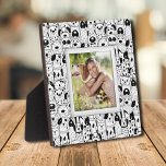 Dogs Pattern Frameless Photo Easel Back Plaque<br><div class="desc">Made to look dimensional, a border of black and white dogs creates a fun frame for your favorite photo on this tabletop plaque with a built-in easel. The image is put directly on the hardboard panel for a stunningly crisp image with an easy wipe clean surface. Great as a gift...</div>