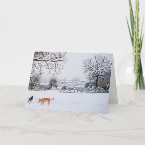 dogs playing in snowy landscape scenic christmas card