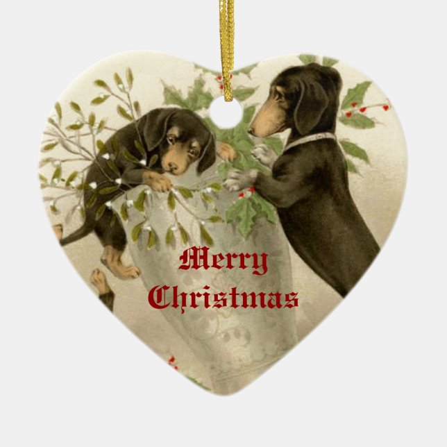 Dogs playing with Christmas mistletoe & holy berry Ceramic Ornament (Front)