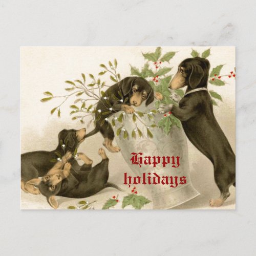 Dogs playing with Christmas mistletoe  holy berry Holiday Postcard