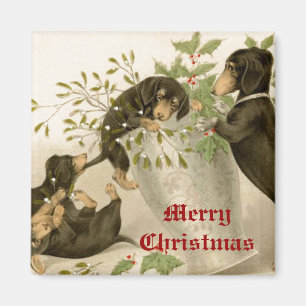 Dogs playing with Christmas mistletoe & holy berry Magnet