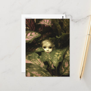 Doll Head in Plants Postcard