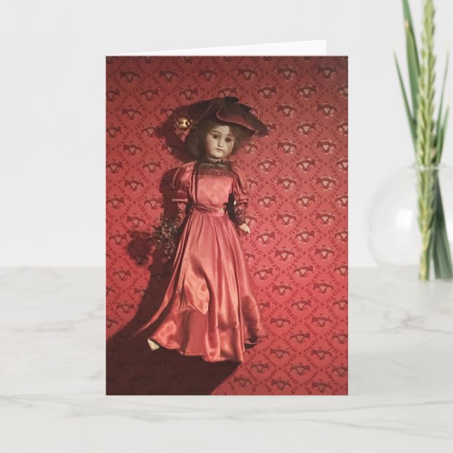 doll on a wall holiday card (Front)