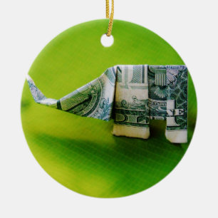 Dollar bill origami Elephant on Green background Ceramic Ornament
