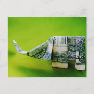 Dollar bill origami Elephant on Green background Postcard
