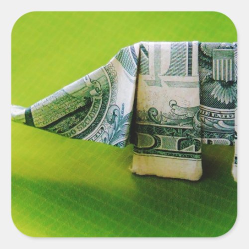 Dollar bill origami Elephant on Green background Square Sticker