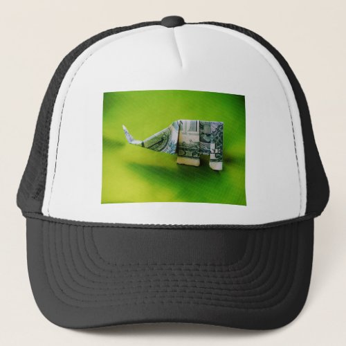 Dollar bill origami Elephant on Green background Trucker Hat