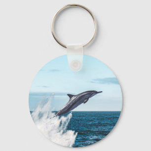 Dolphin leaping out of the ocean keychain