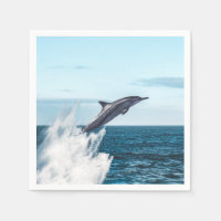 Dolphin leaping out of the ocean