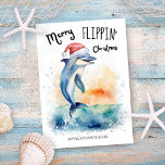 Dolphin Santa Merry Flippin' Christmas Beach Holiday Card<br><div class="desc">Share some holiday humor and your "Merry Flippin' Christmas" greetings with this nautical watercolor card featuring a happy dolphin in a Santa hat flipping its tail and splashing in the sea. Perfect for those who love the beach and ocean creatures. Art by KL Stock</div>