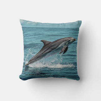 Dolphins: A Symbol of Freedom and Happiness Throw Pillow