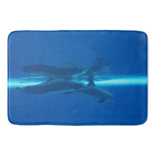 Dolphins and reflection, blue ocean bath mat