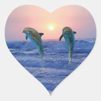 Dolphins At Sunrise Heart Sticker by laureenr at Zazzle