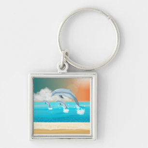 dolphins breaching in the ocean keychain