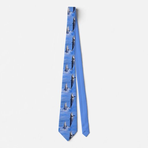 Dolphins jumping out of water neck tie