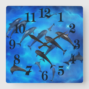 Dolphins swimming in the ocean square wall clock