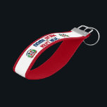 Dominican Republic Flag Charming Patriotic Wrist Keychain<br><div class="desc">Dominican Republic Flag Charming Patriotic Wrist Keychain with the two inscriptions "Dominican Republic" infused with the pattern from the Dominican Republic national flag placed opposite each other. Inside and outside of the Wrist Keychain are covered in the complementary colors. The Dominican Republic Coat of Arms is placed on the left...</div>