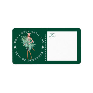 Don’t Open Until Christmas Girl Holding Tree Label