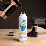Donald Duck Peace Sign Water Bottle<br><div class="desc">Brighten up your wardrobe with this electric and cheerful Donald Duck illustration! Featuring a classic full-body pose with a friendly peace sign, this design gets a stylish update with a vibrant, non-traditional color palette. The combination of bright cyan, magenta, and sunny yellow gives this artwork a fresh, "neon-pop" aesthetic that...</div>
