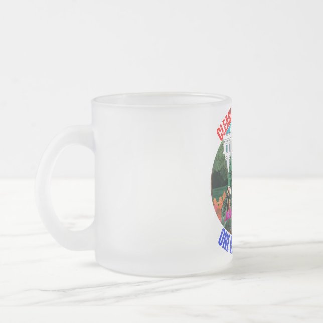 DONALD TRUMP-CLEANING UP AMERICA ONE BAG AT A TIME FROSTED GLASS COFFEE MUG (Left)