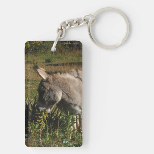 Donkey eating wildflowers keychain